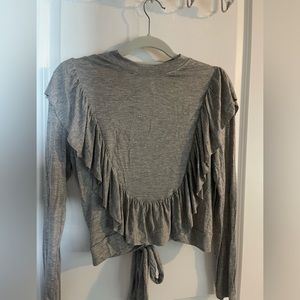 Boutique shirt with open back and high neck